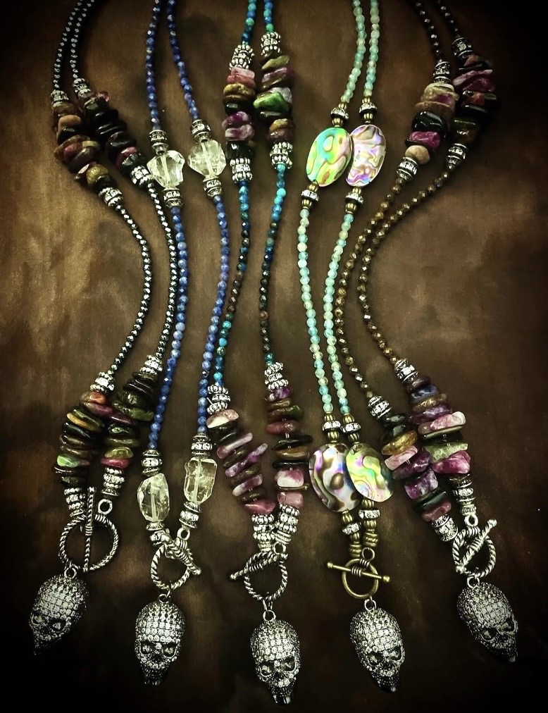 Colorful gemstone lovebeads with skull charms